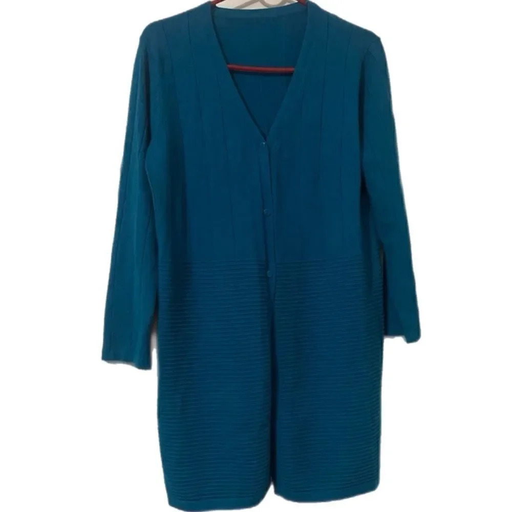 A beautiful aqua blue sweater in the size large